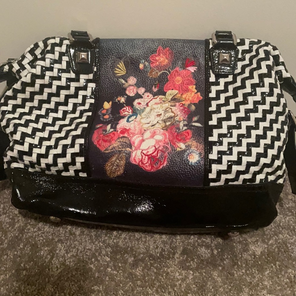 Designed in New York by Sharif Purse.
